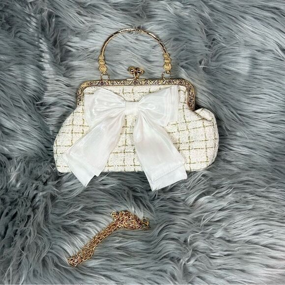 White and Gold Quilted Clutch with Bow - Picture 1 of 7